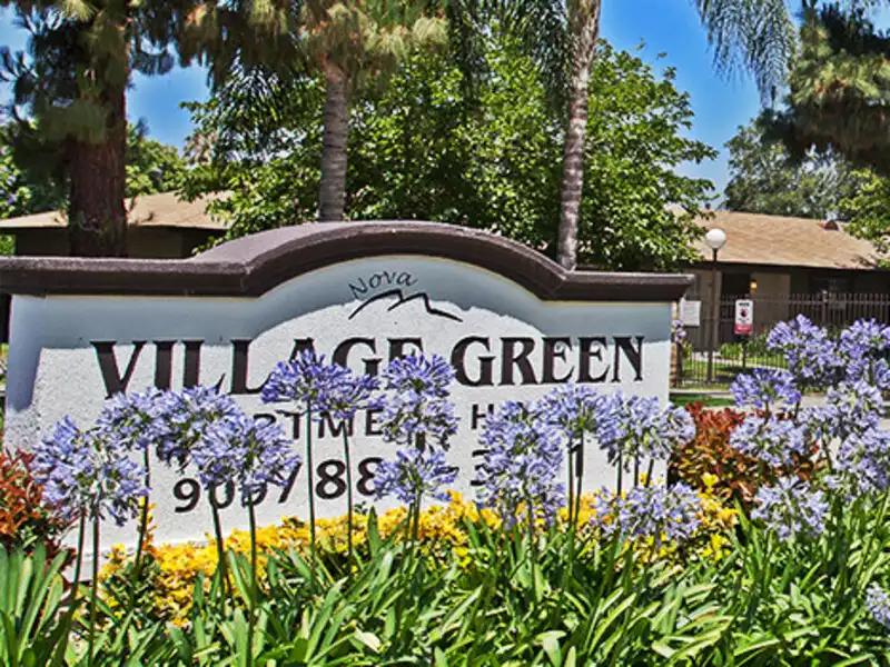 Monument Sign | Village Green Apartments in San Bernardino, CA