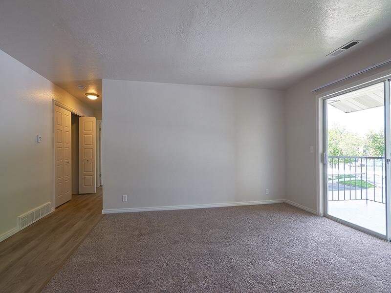 Living Room and Balcony | Willow Cove Apartments