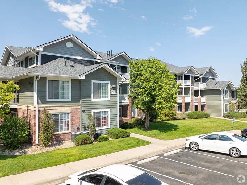Apartment Exterior and Parking Lot | Dayton Meadows