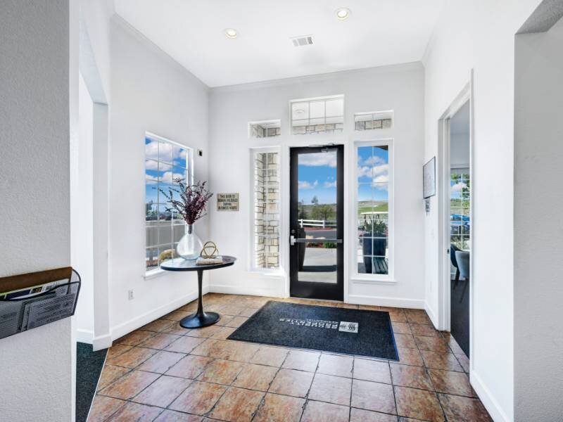 Clubhouse Entry | Reserve at Thornton I & II Apartments