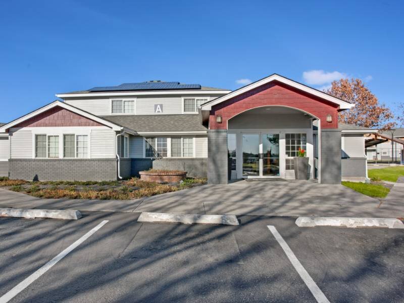 Clubhouse Exterior | Heatherstone Apartments in Kennewick, WA