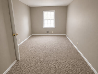 Interior Bedroom with Window and Carpeted Flooring | Linkwood Manor