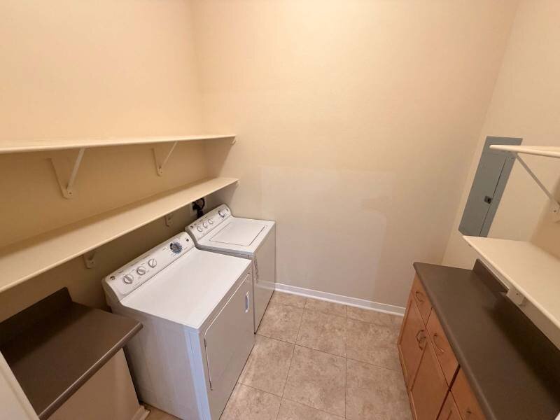 Laundry Room | Residence at University Hills Apartments