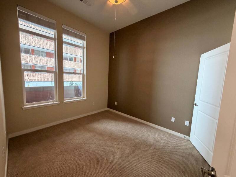 Bedrooms with Large Windows | Residence at University Hills Apartments