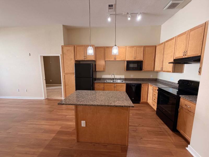 Kitchen Island | Residence at University Hills Apartments