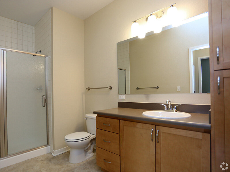 Bathroom with a Sink and Mirror | Residence at University Hills