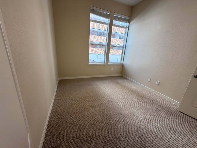 Bedroom with Abundant Natural Lighting | Residence at University Hills Apartments