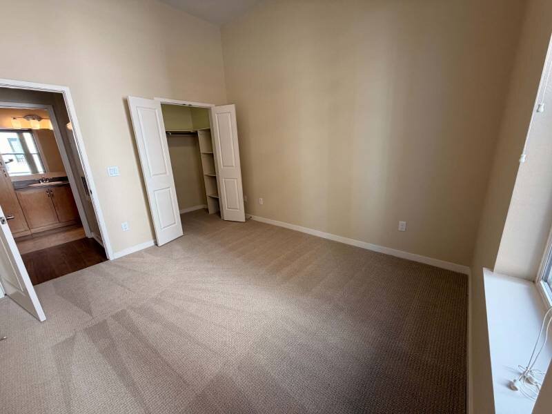 Carpeted Bedrooms | Residence at University Hills Apartments