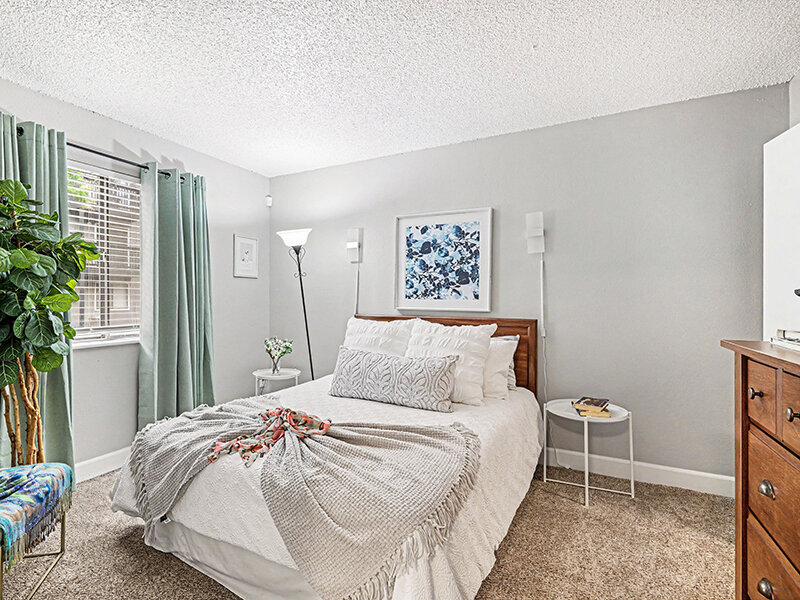 Bedroom with Window and Carpeted Flooring | Innovation at Fitz