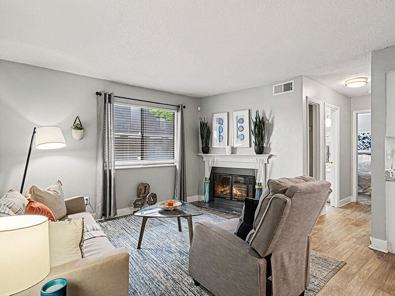 Living Room with Fireplace and Recliner | Innovation at Fitz