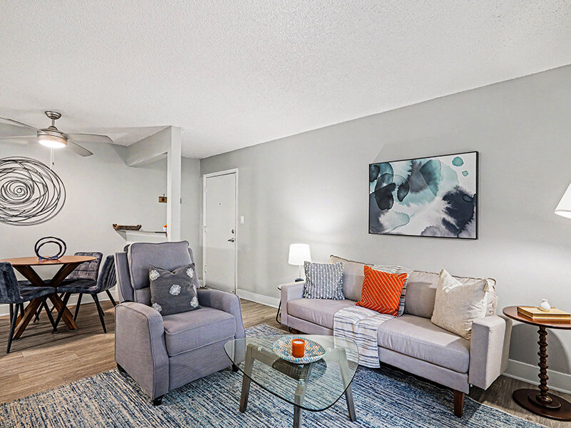 Living Room with Sofa and Hanging Art | Innovation at Fitz