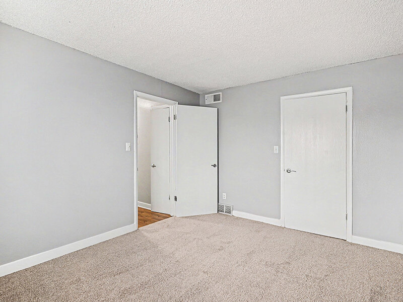 Bedroom with Closet and Carpeted Flooring | Innovation at Fitz