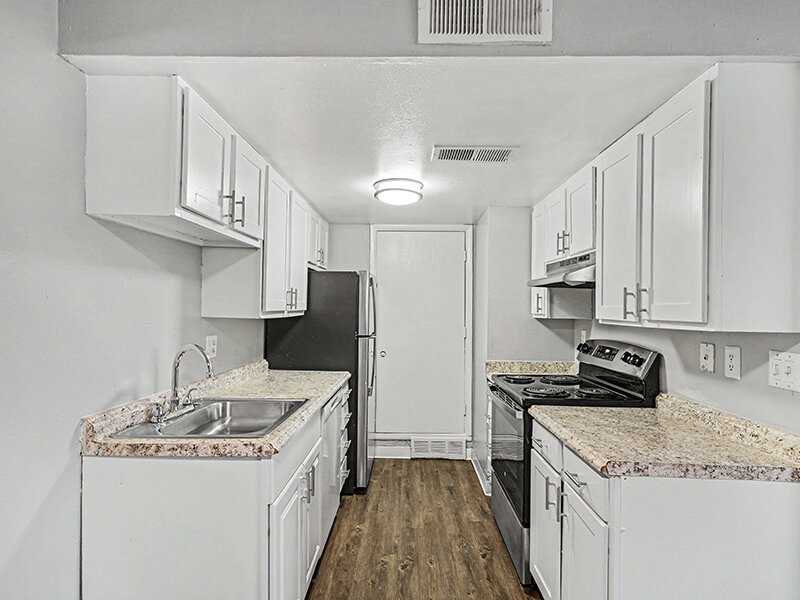 Kitchen with Ceiling Light with Wood Style Flooring | Innovation at Fitz