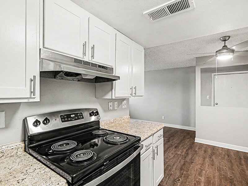 Kitchen Stove with Wood Styled Flooring | Innovation at Fitz