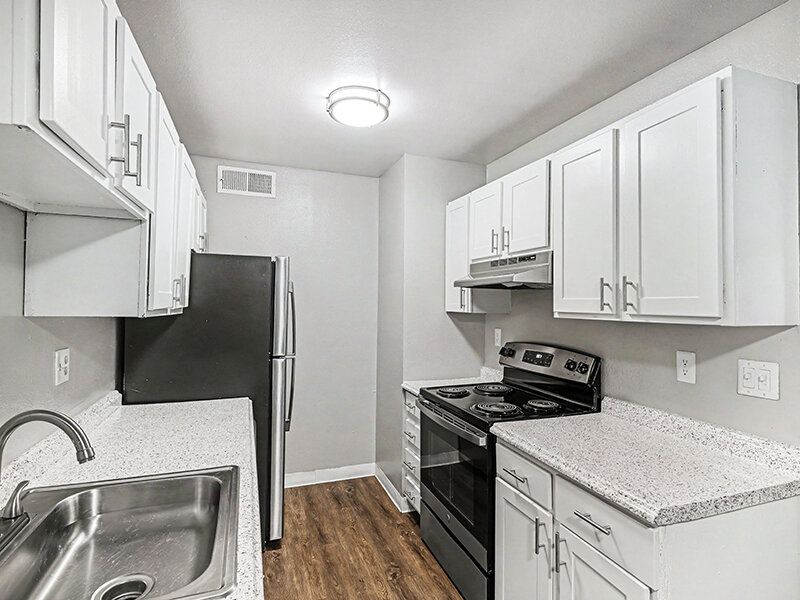 Kitchen with Appliances and Wood Styled Flooring | Innovation at Fitz