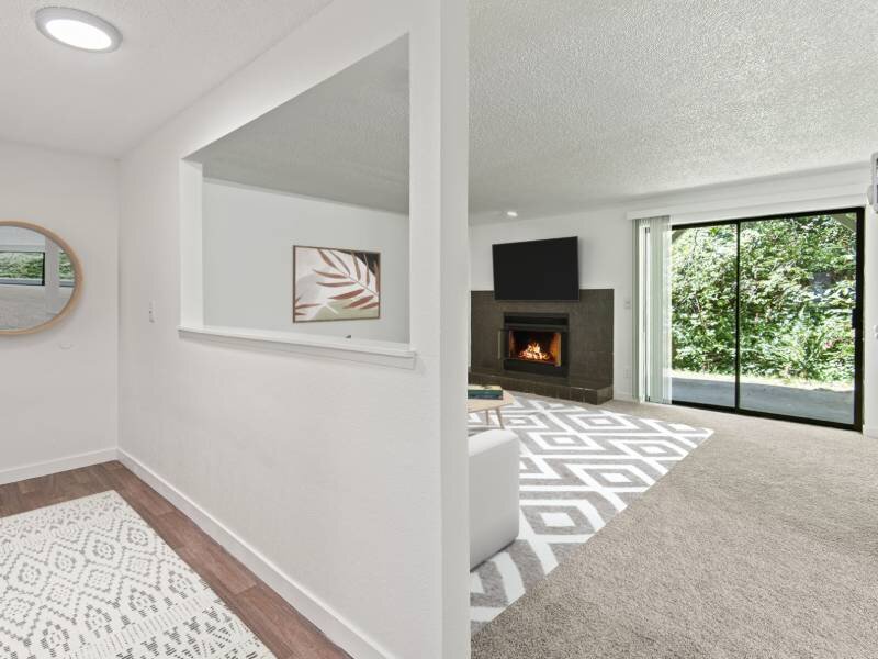 Front Room with Fireplace | Hampton Court Apartments