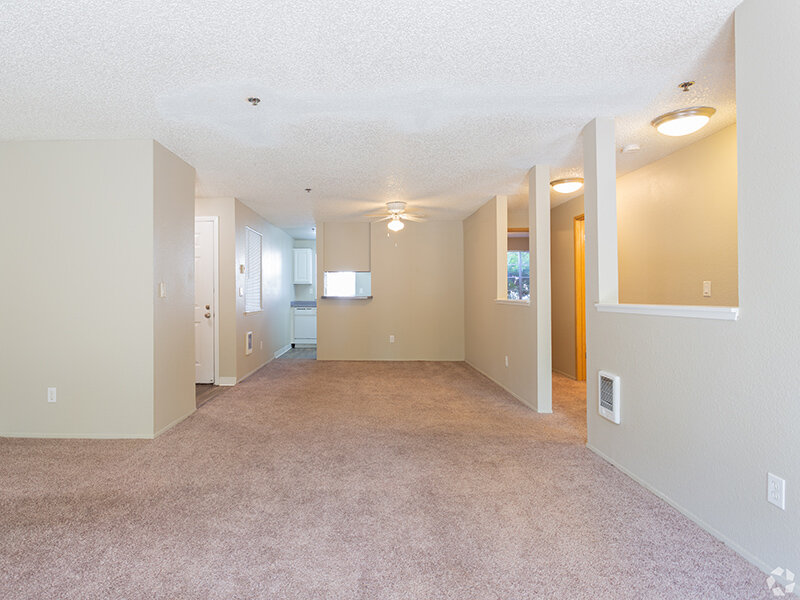 Carpeted Living Rooms | Mallard Point at Riverbend Apartments