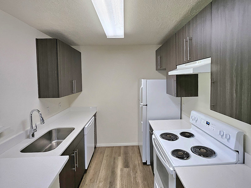 Kitchen with White Appliances | Canyon Pointe Apartments