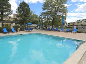 Swimming Pool with Poolside Furniture | The Parker Apartments