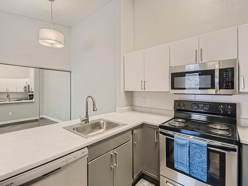 Kitchen and Dining Area | Preserve at City Center Apartments in Aurora, CO