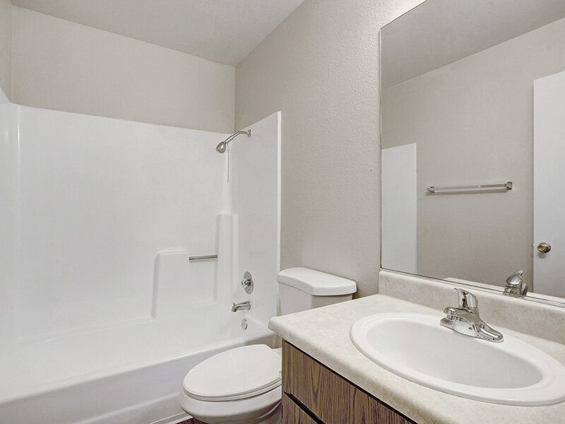 Bathroom with Shower and Kitchen Sink | Arborelle Apartments