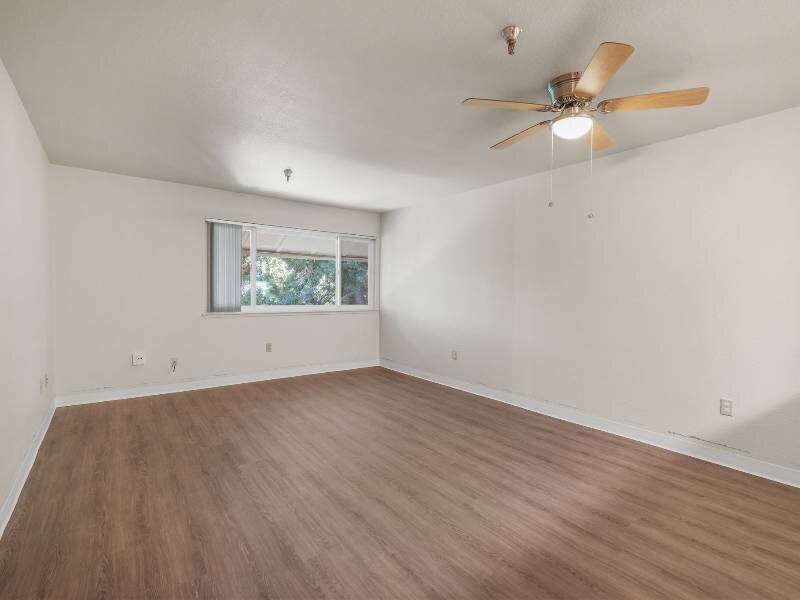 Front Room with Ceiling Fan | Albert Einstein Apartments