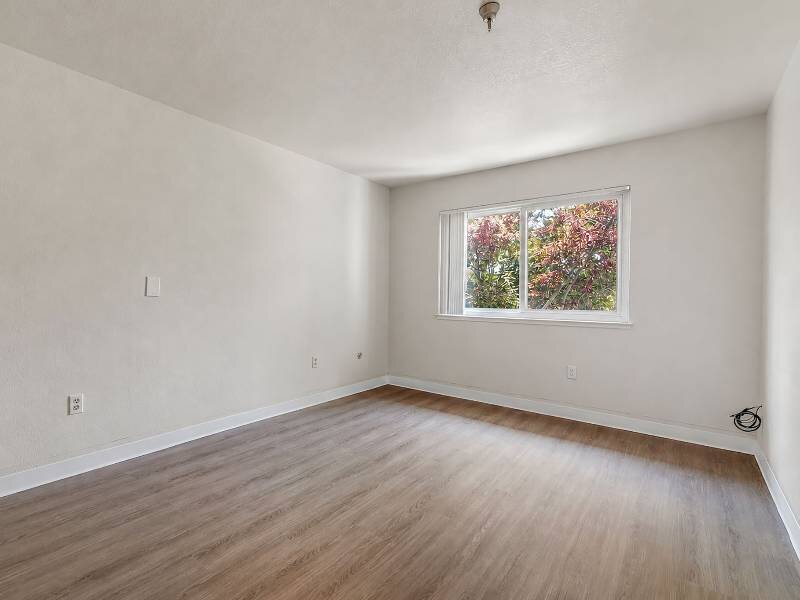 Bedroom with Wood Like Flooring | Albert Einstein Apartments