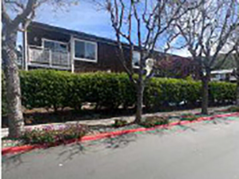 Apartment Complex with Bushes and Trees |  Parnow Friendship House