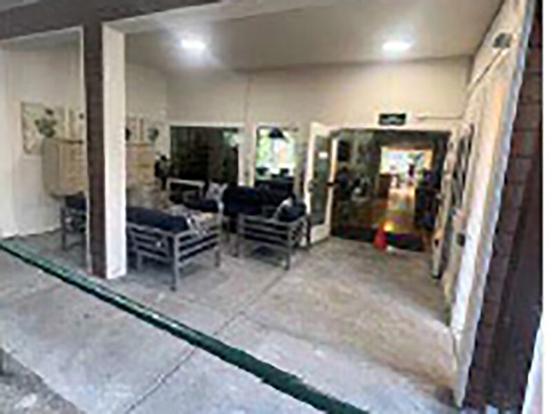 Apartment Area with Seating and Stone Styled Flooring |  Parnow Friendship House
