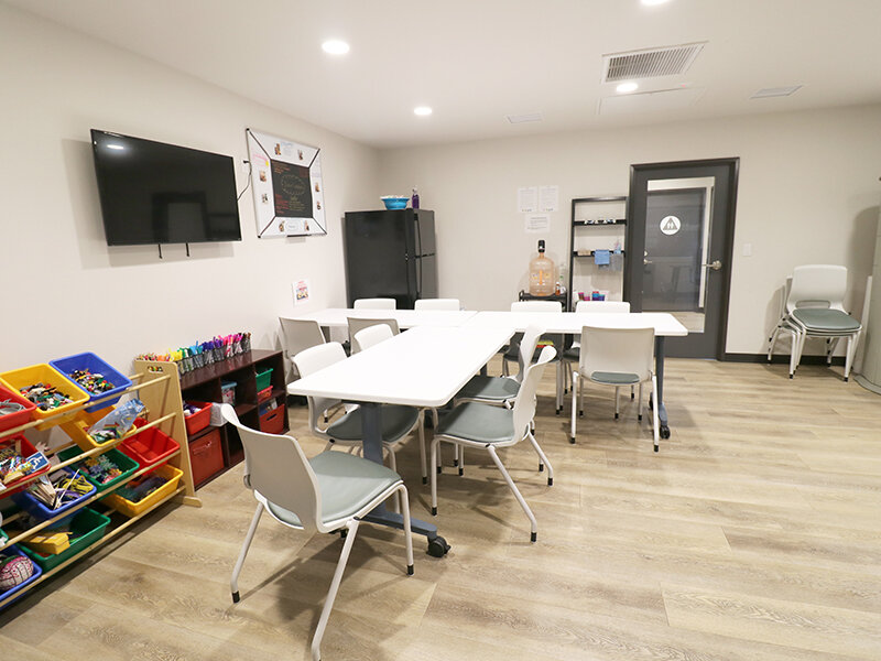 Community Room with Television | Broadway Apartments
