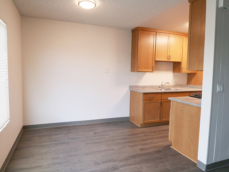 Kitchen  with Wood Styled Flooring | Broadway Apartments