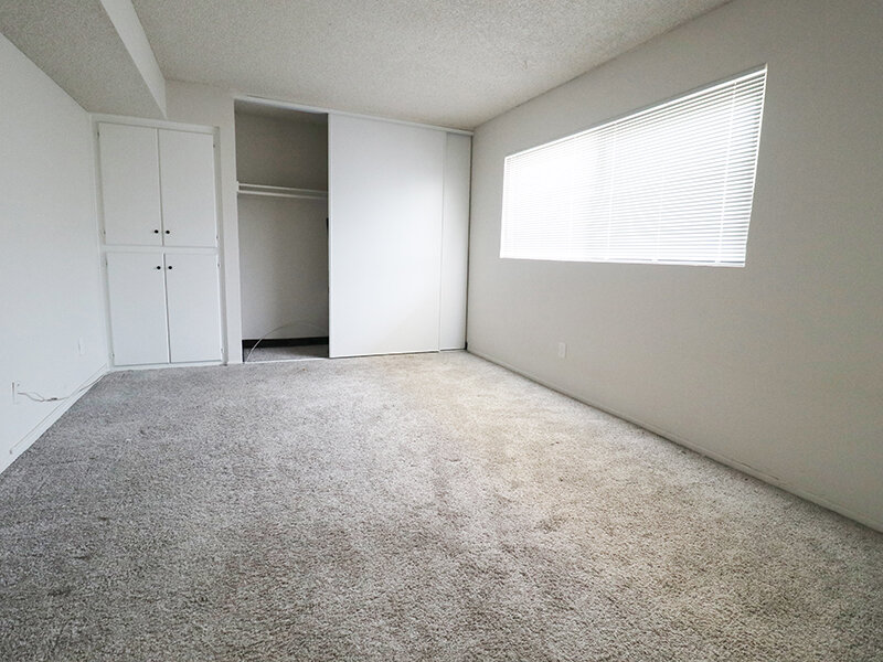 Apartment Bedroom with Carpeted Flooring | Broadway Apartments