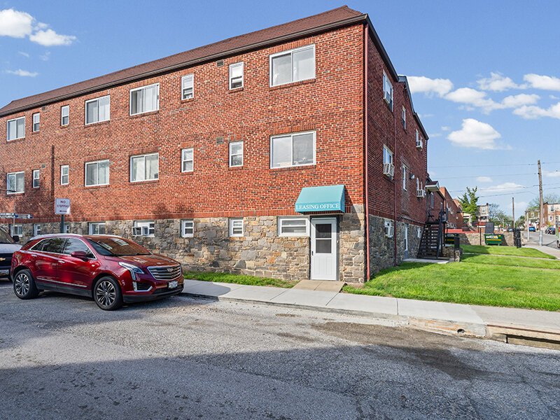 Exterior Apartment Building with Parking | The Mayflower