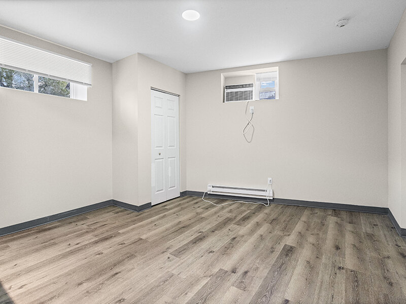 Wood Style Living Room with Wood Styled Flooring and Ceiling Light | The Mayflower
