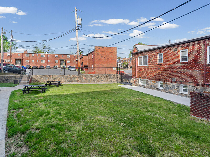 Apartment Complex with Sidewalk and Outdoor Views | The Mayflower