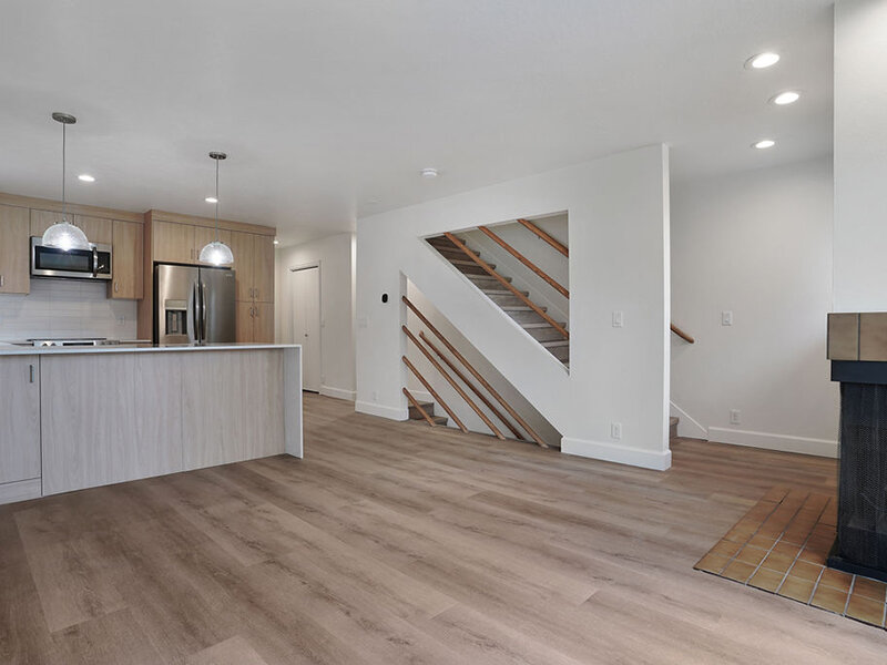 Living Room with View of Stairwell and Kitchen | Residences at J Ranch