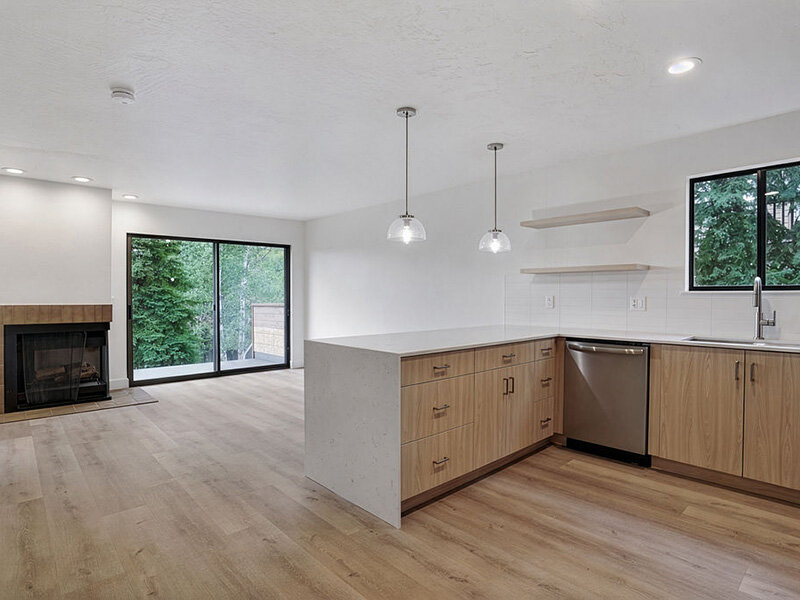 Kitchen with Ceiling Light and Wooden Style Cabinets | Residences at J Ranch