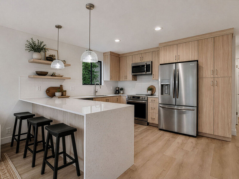 Furnished Kitchen and Wood Style Flooring with Ceiling Lights and Window | Residences at J Ranch
