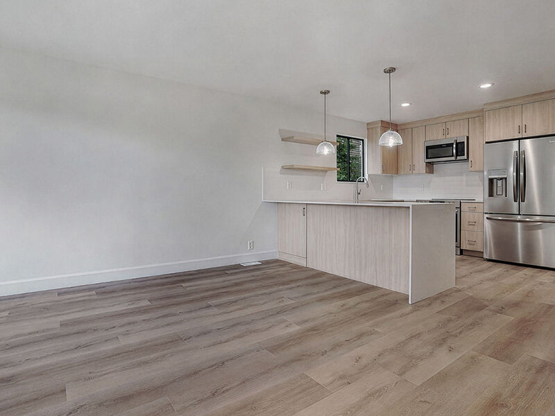 Kitchen with Ceiling Light and Wood Style Flooring | Residences at J Ranch