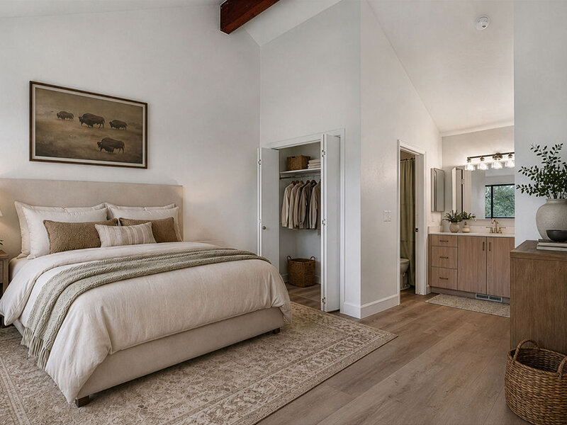 Furnished Bedroom with Open Closet and Wood Style Flooring | Residences at J Ranch
