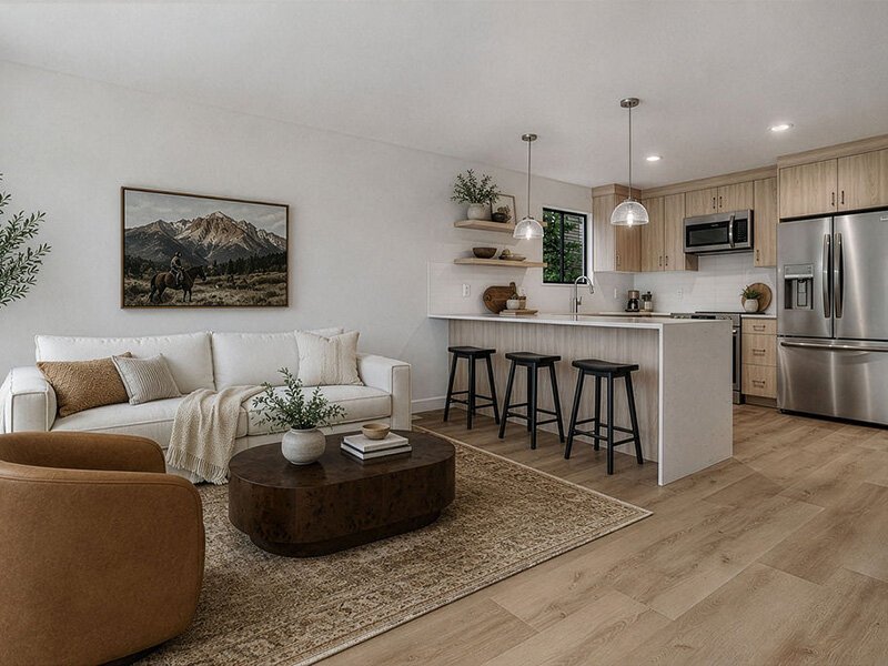 Furnished Apartment with Coffee Table and Sofa with View of Kitchen | Residences at J Ranch