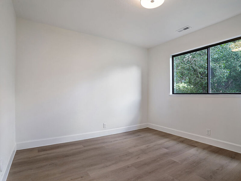 Bedroom with Ceiling Light and Wood Style Flooring | Residences at J Ranch