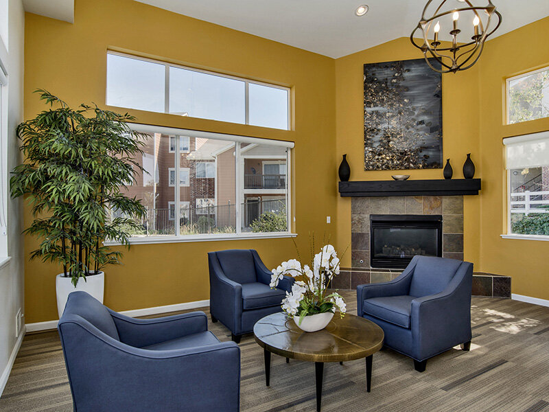 Community Seating with Wood Style Flooring, Windows, and a Fireplace | The Bluffs at Castle Rock