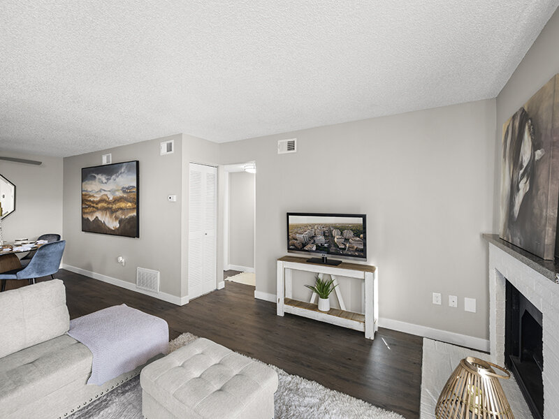 Living Room with Wood Styled Flooring and Rug with Television | Rosemont West 84th