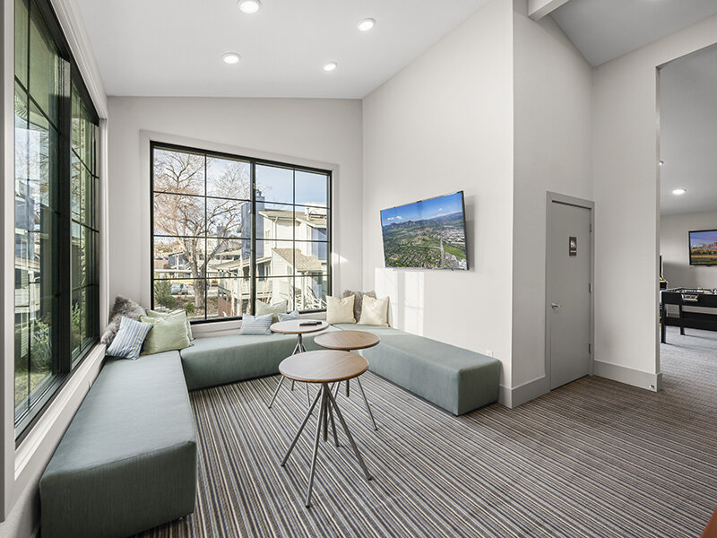 Seating Area with Hanging Painting and Community Bathroom | Rosemont West 84th
