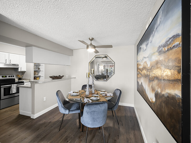 Dining Table with Wood Styled Flooring and Ceiling Fan | Rosemont West 84th