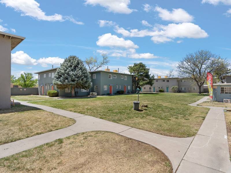 Exterior with Pet Stations Throughout | Nob Hill Apartments in New Mexico
