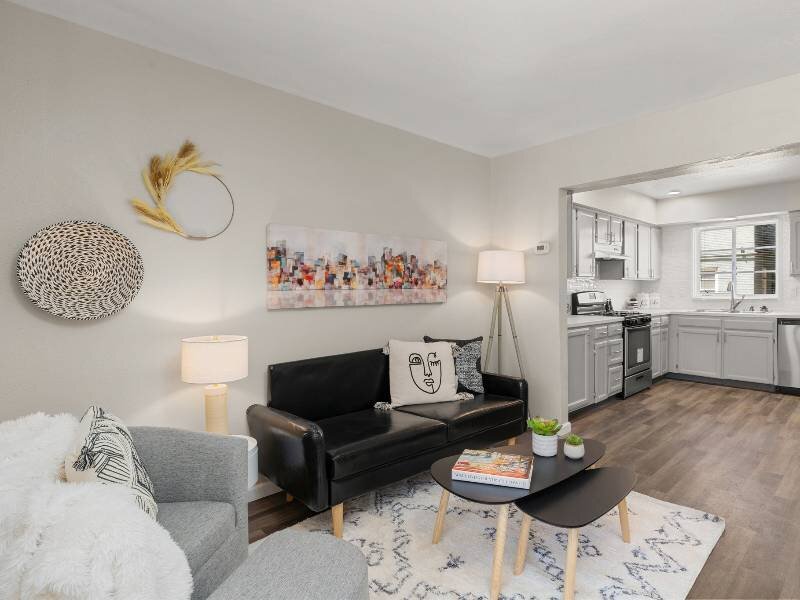 Living Room with Wood Like Flooring | Nob Hill Apartments