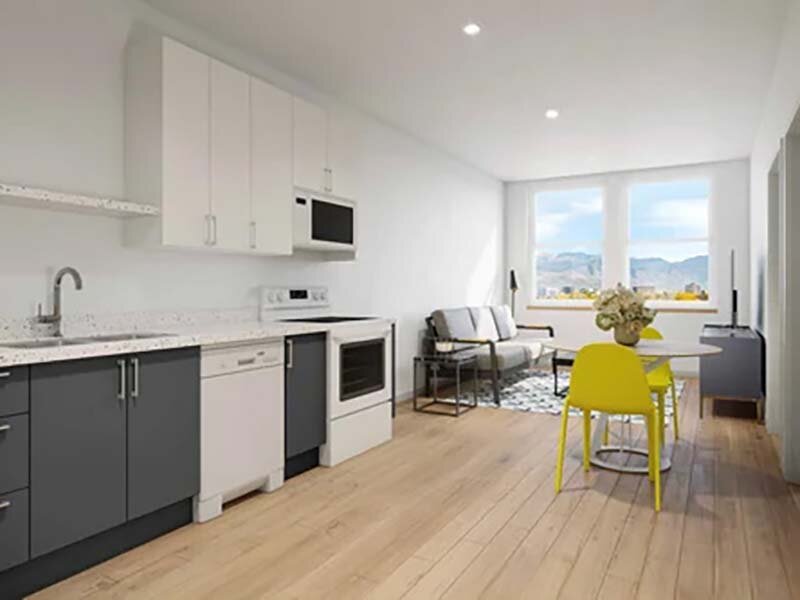 Kitchen with Cabinets and Living Room View Rendering | King's Crossing Village