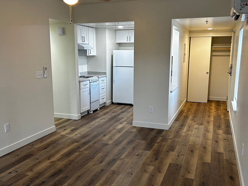 Kitchen with Wood Style Floors and Open Closet | Riverside